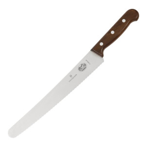 Konditorikniv med tandad böjd klinga 25,5 cm - Victorinox - Fourniresto